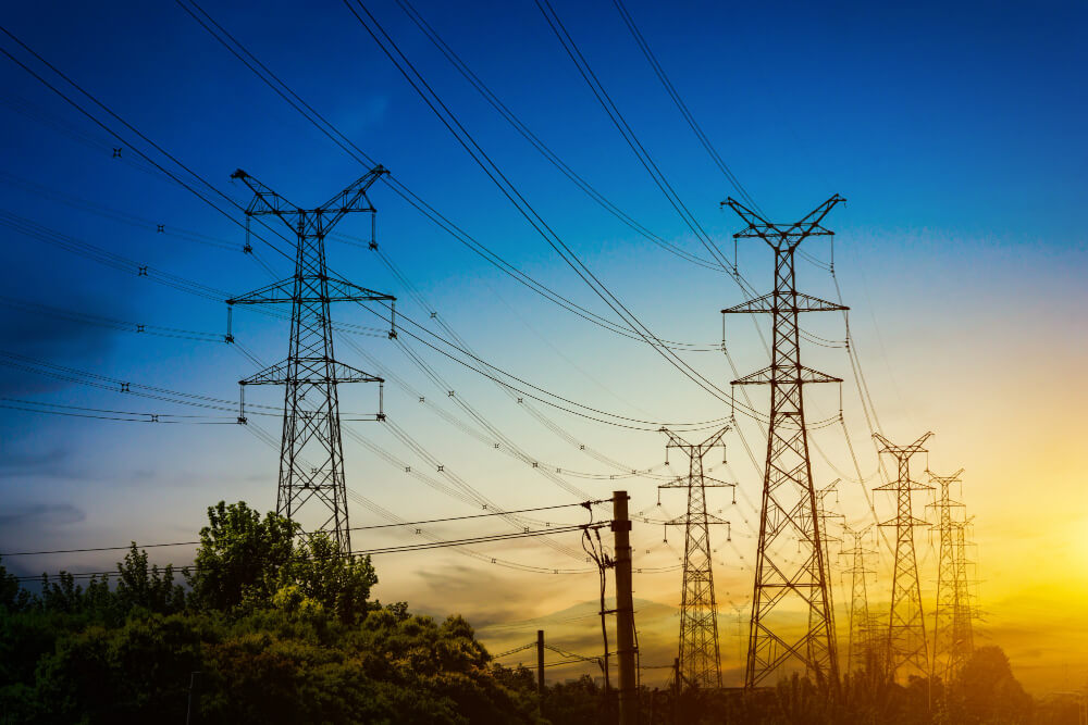 sun-setting-silhouette-electricity-pylons (1)